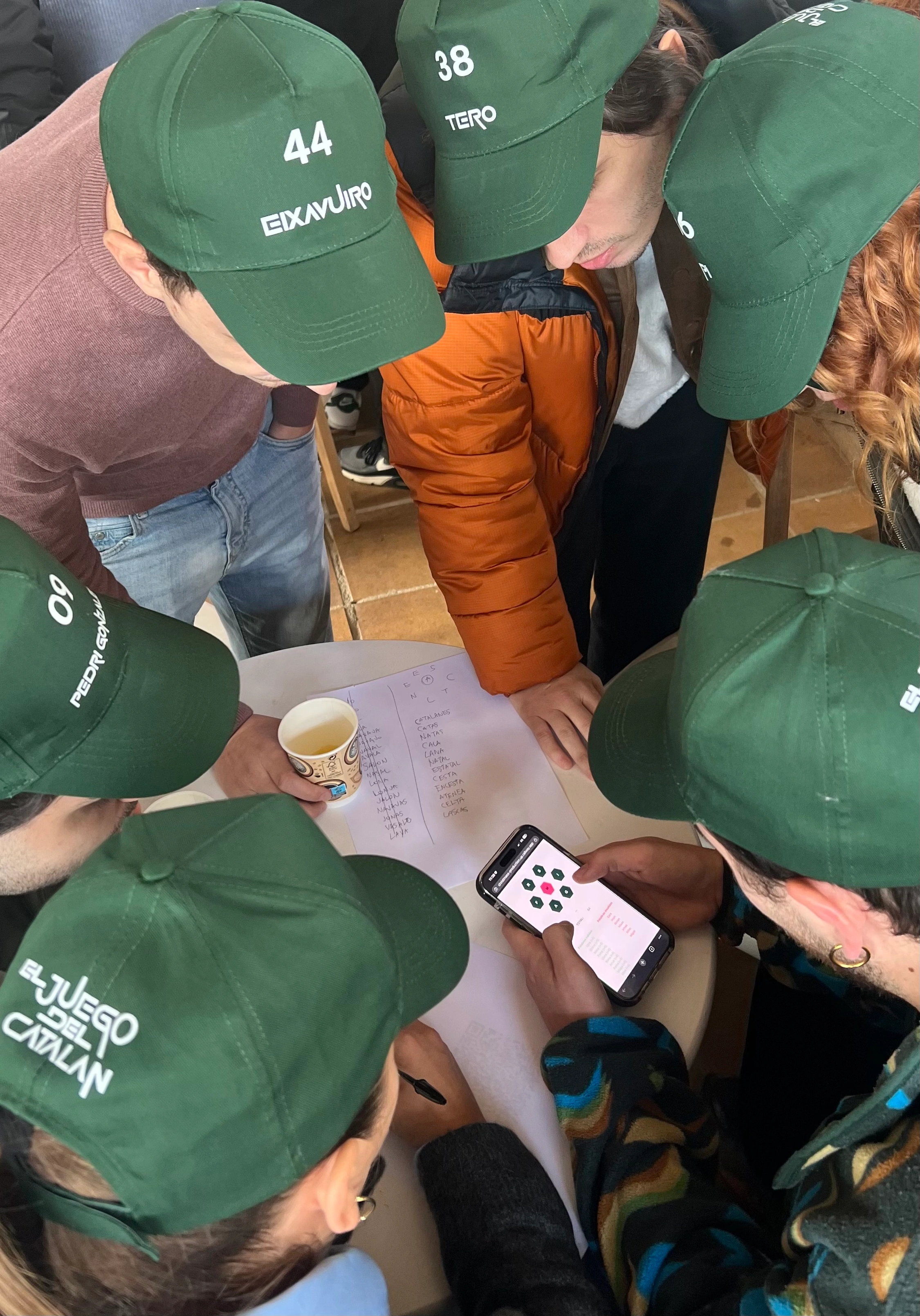The team is focused, trying to solve a puzzle.